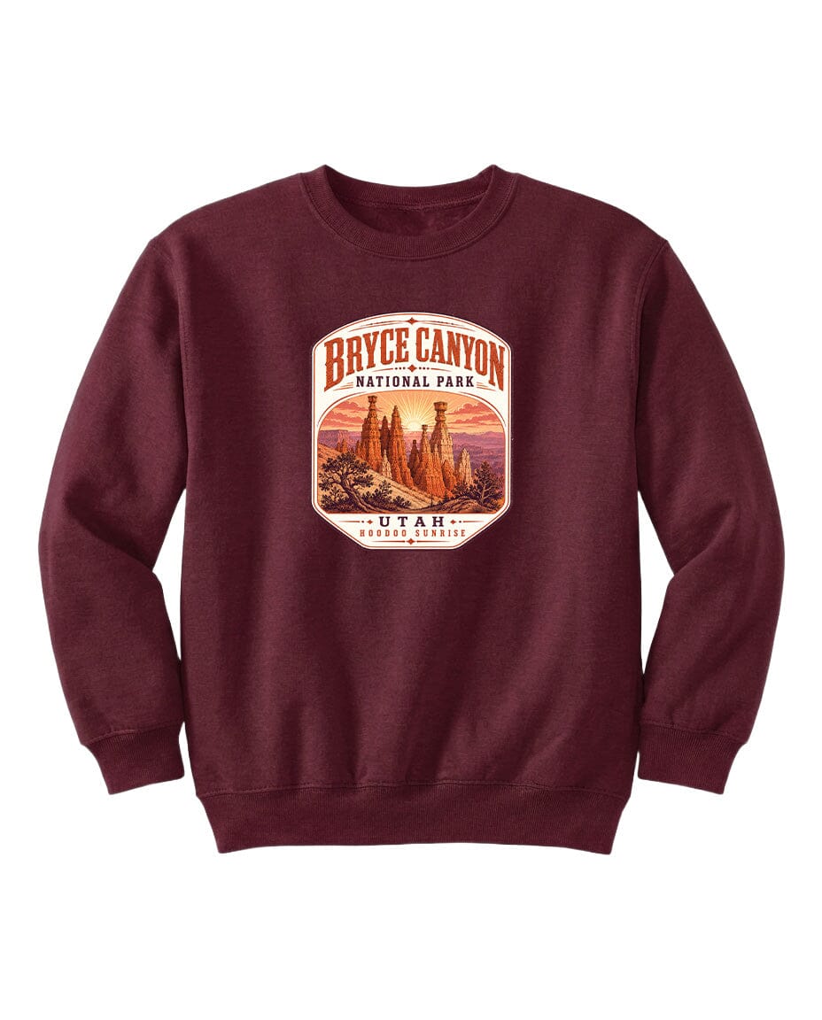 A burgundy-colored sweatshirt with a graphic design depicting Bryce Canyon National Park and Utah.