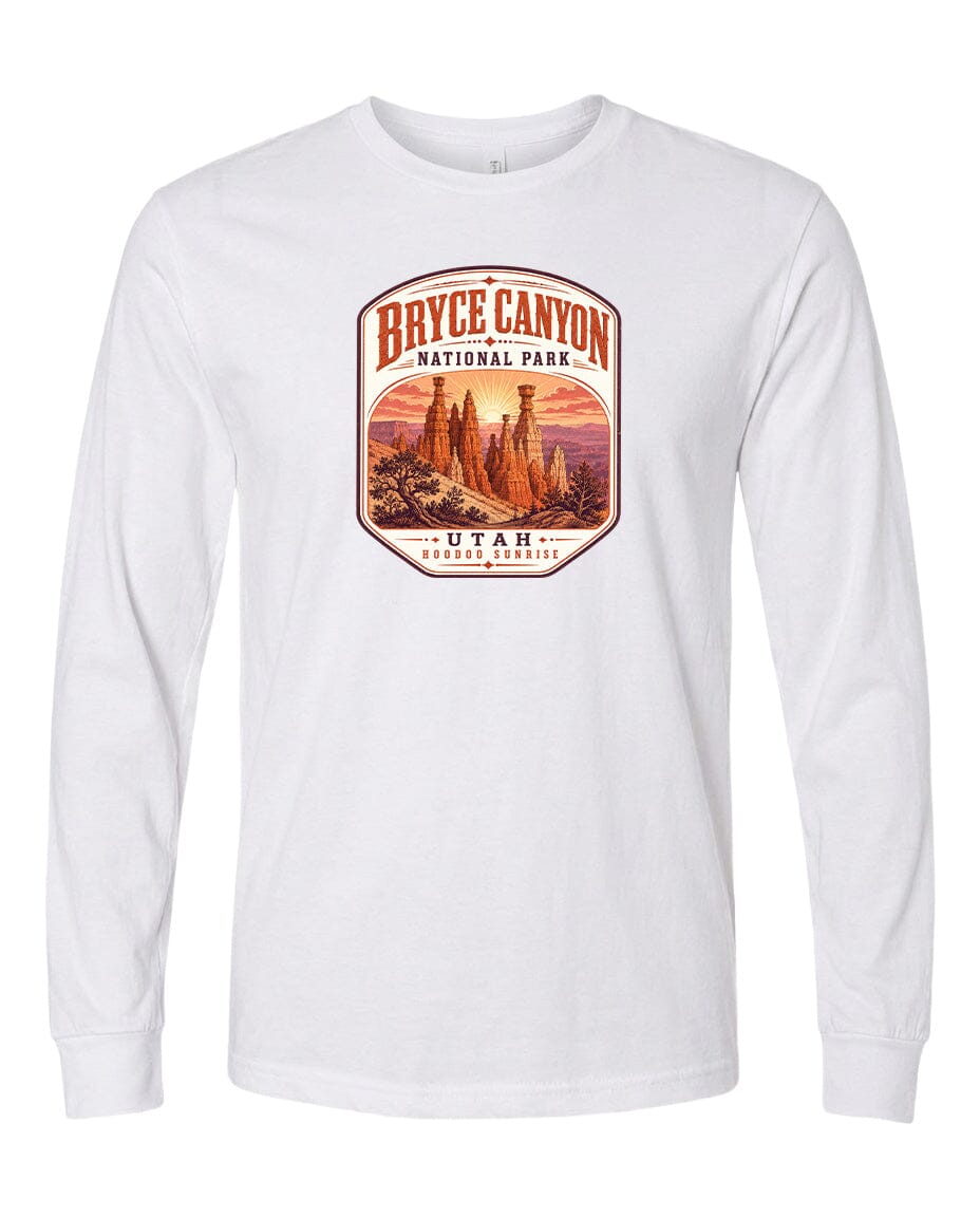 A white long-sleeved t-shirt with a graphic design depicting the Bryce Canyon National Park in Utah.