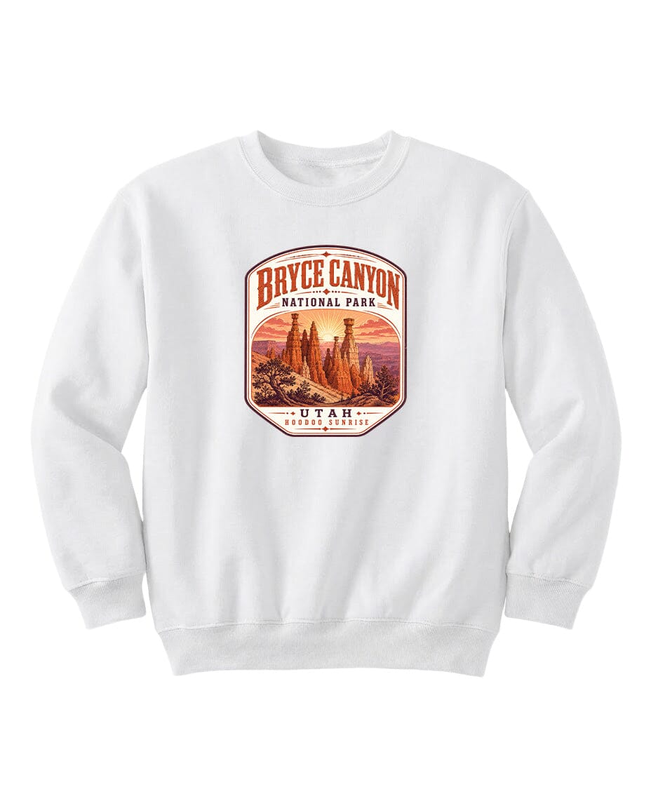 A white sweatshirt with a graphic design depicting Bryce Canyon National Park and Utah.