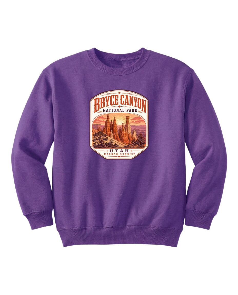A purple sweatshirt with a graphic design featuring the Bryce Canyon National Park in Utah.