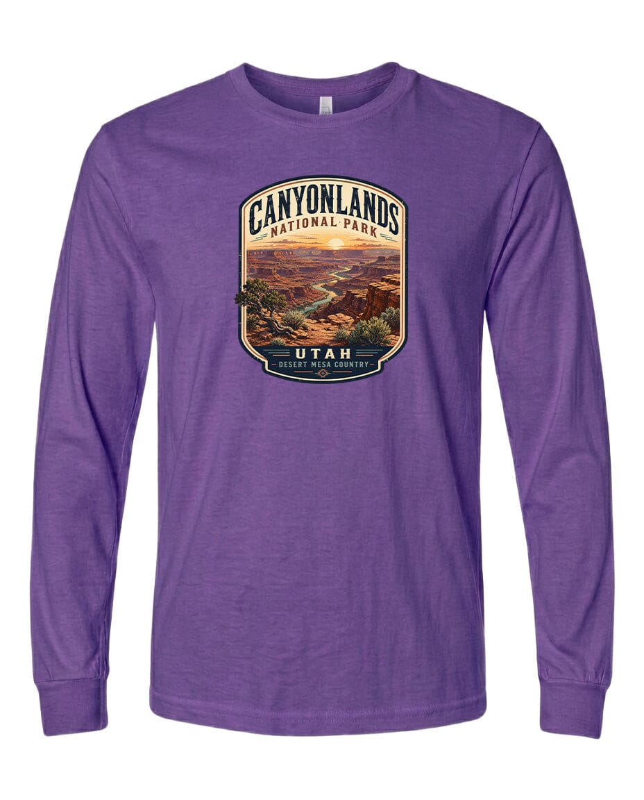 A purple long-sleeved t-shirt with a graphic design depicting the scenic landscape of Canyonlands National Park in Utah.