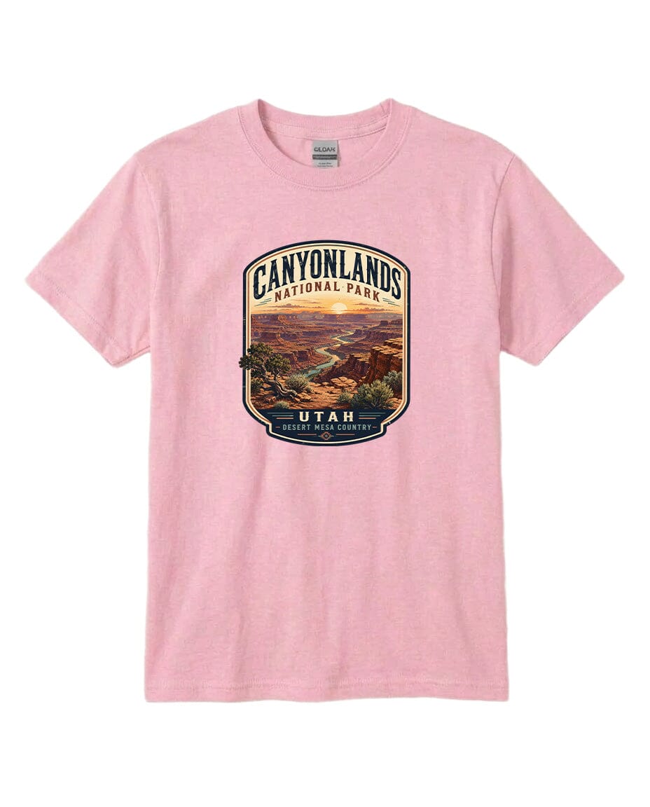 A pink t-shirt with a graphic design depicting a scenic landscape, specifically the Canyonlands National Park in Utah.