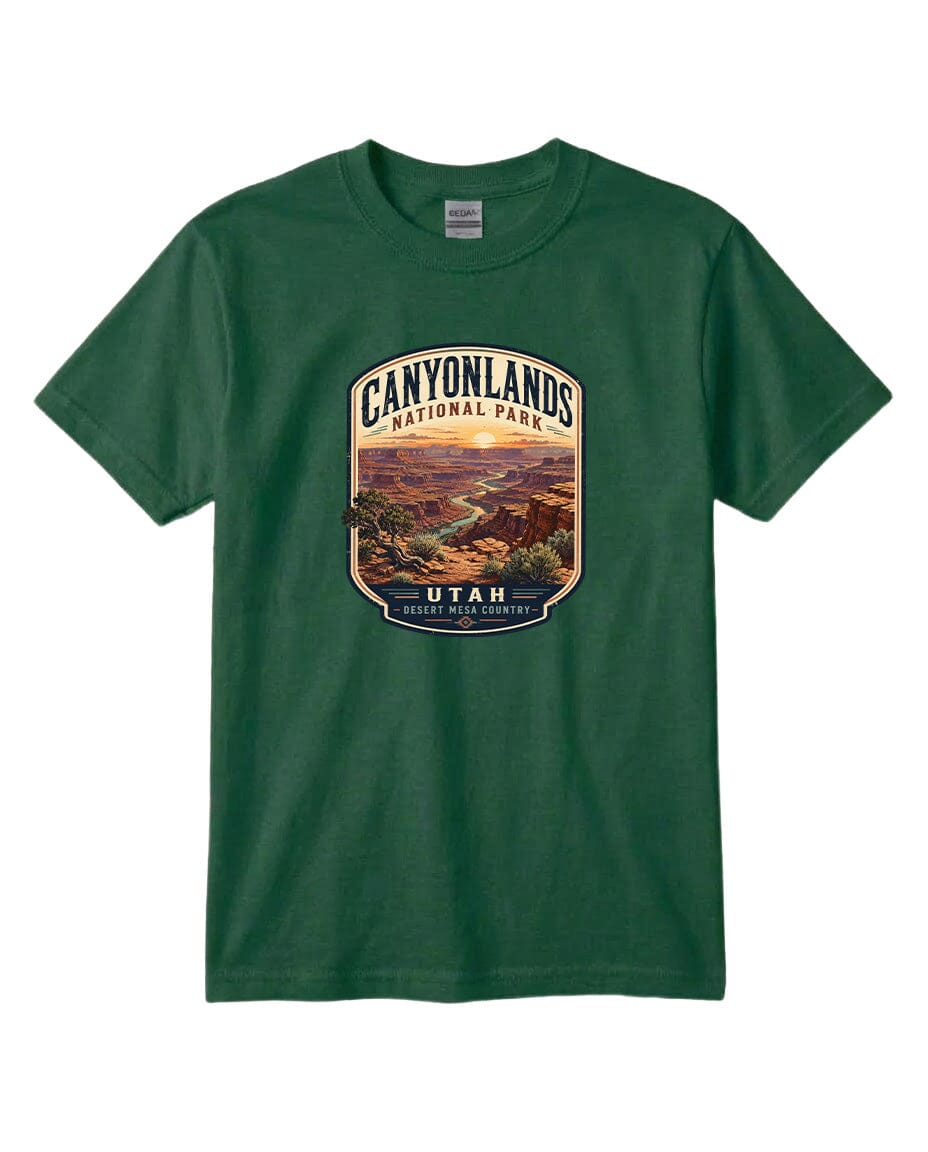 A green t-shirt with a graphic design depicting a scenic landscape, including mountains, a river, and a desert landscape, with the text "CANYONLANDS NATIONAL PARK UTAH DESERT MESERICA" printed on it.