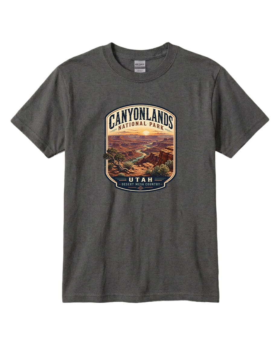 A gray t-shirt with a graphic design depicting a scenic landscape of the Canyons National Park in Utah.