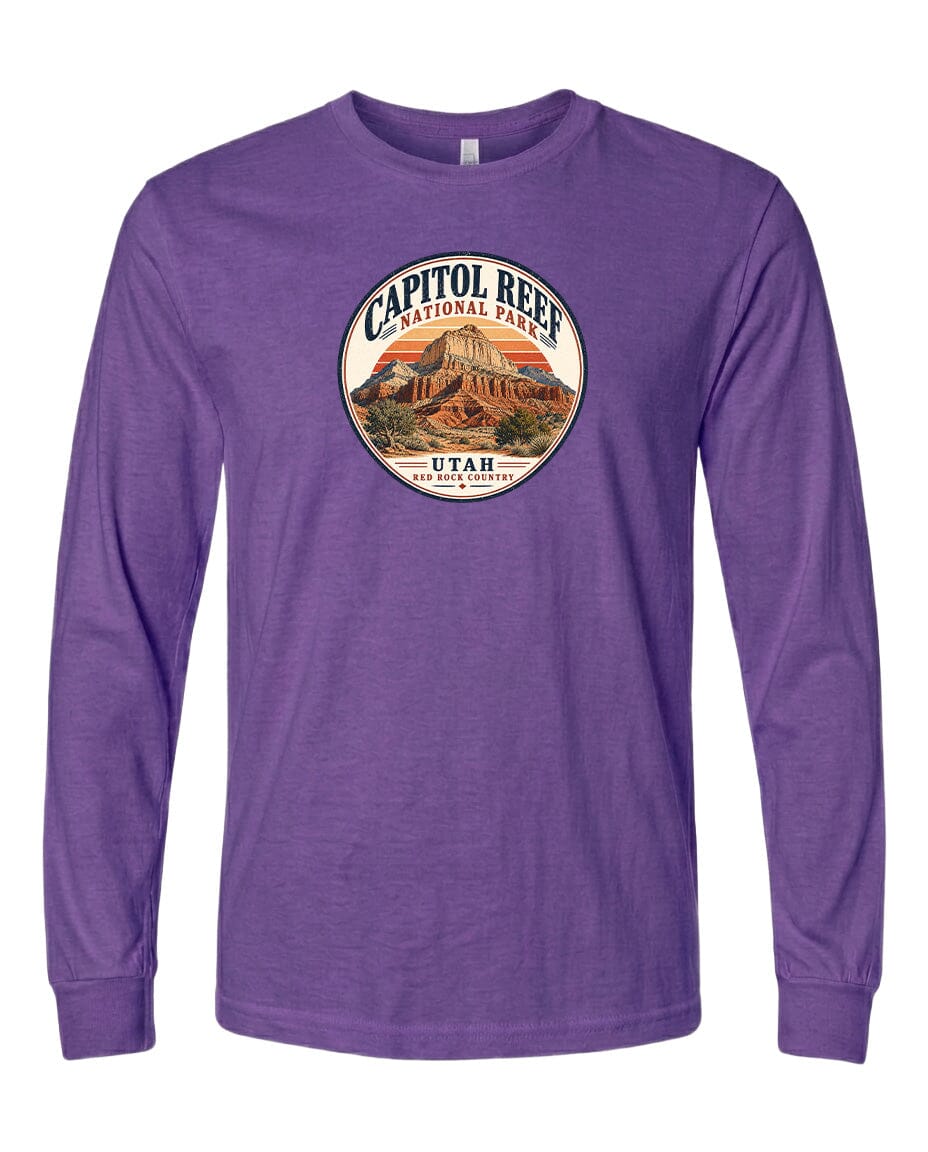 A purple long-sleeved t-shirt with a circular graphic design featuring the Capitol Reef National Park in Utah.