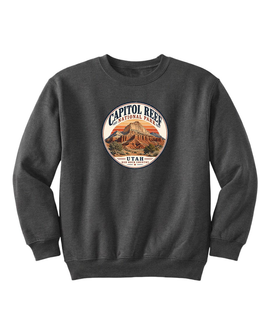 A gray sweatshirt with a circular design featuring the Capitol Reef National Park logo and the text "UTAH" printed on it.