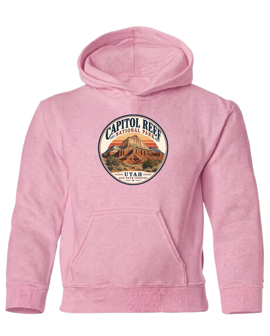 A pink hoodie with a circular logo that says "CAPITOL REEF NATIONAL PARK UTAH" printed on it.