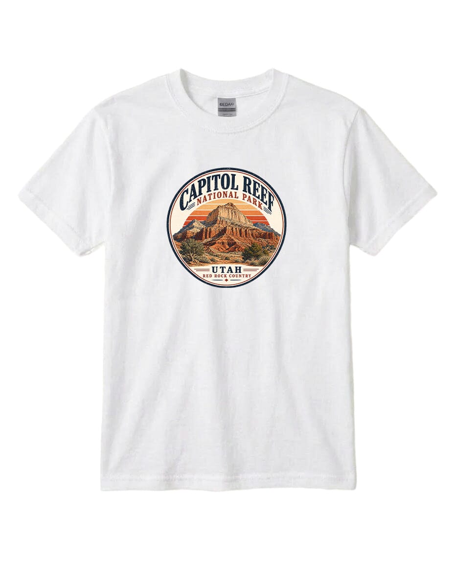 A white t-shirt with a circular graphic design featuring the Capitol Reef National Park in Utah.