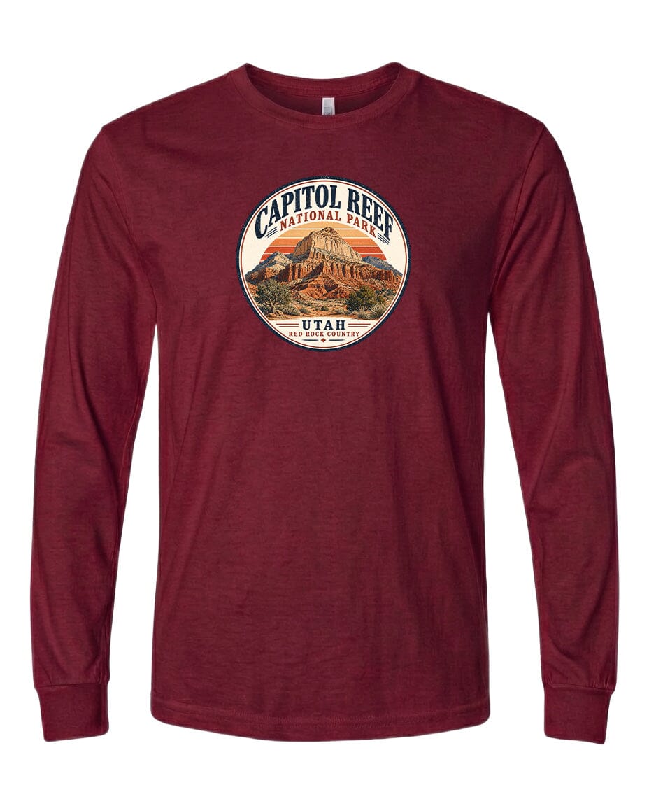 A red long-sleeved t-shirt with a circular graphic design featuring the Capitol Reef National Park in Utah.
