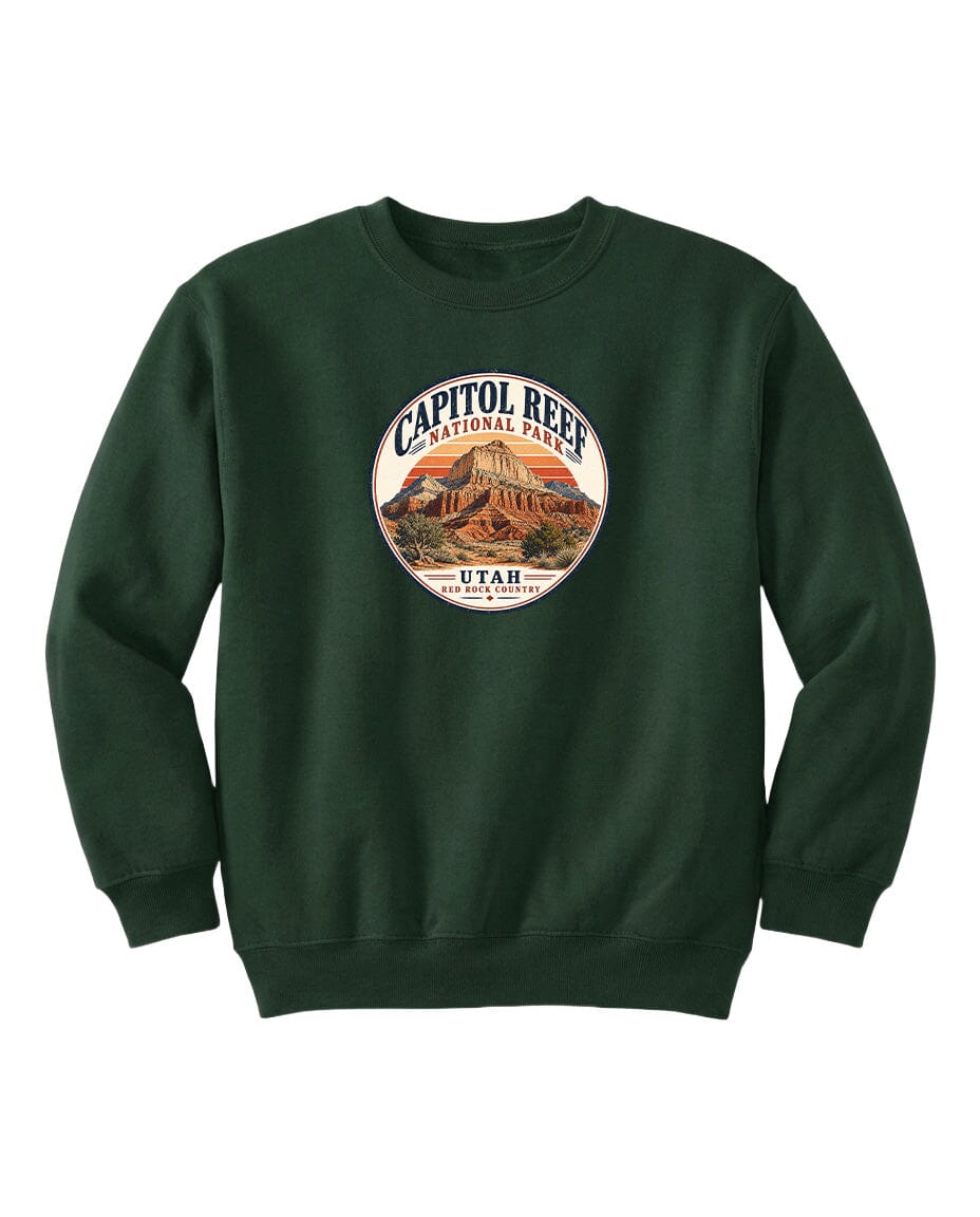 A dark green sweatshirt with a circular logo that says "CAPITOL REEF NATIONAL PARK UTAH" and features an illustration of a mountain.