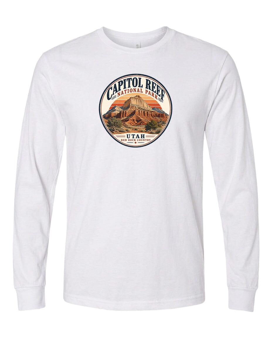 A white long-sleeved t-shirt with a circular design featuring the Capitol Reef National Park in Utah.