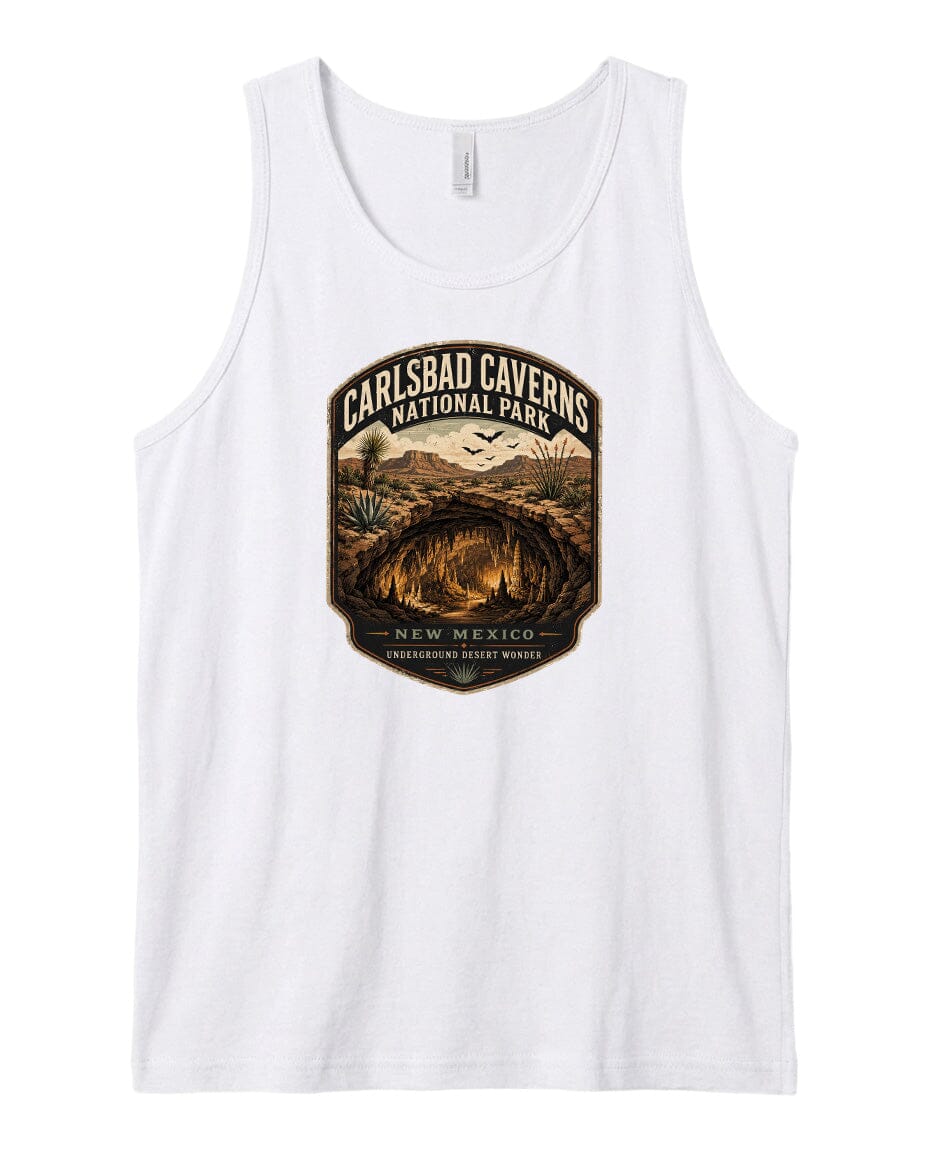 A white tank top with a graphic design featuring a desert landscape and the text "CARLSBAD CAVENS NATIONAL PARK NEW MEXICO UNDERGROUND WONDERER".