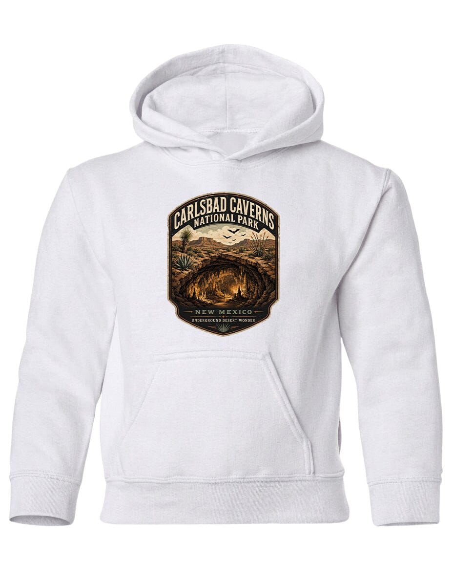 A white hoodie with a graphic design featuring a desert landscape and the text "CARLSBAD CAVENS NATIONAL PARK" printed on it.