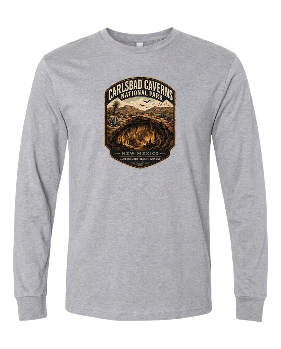 A gray long-sleeved t-shirt with a graphic design featuring the Carlsbad Caves National Park in New Mexico.