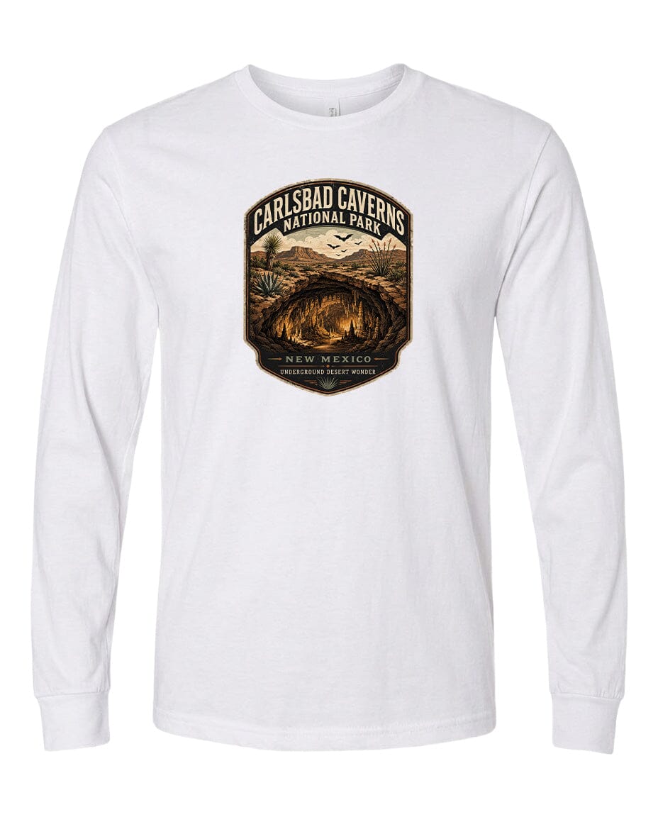 A white long-sleeved t-shirt with a graphic design depicting the Carlsbad Caverns National Park in New Mexico.