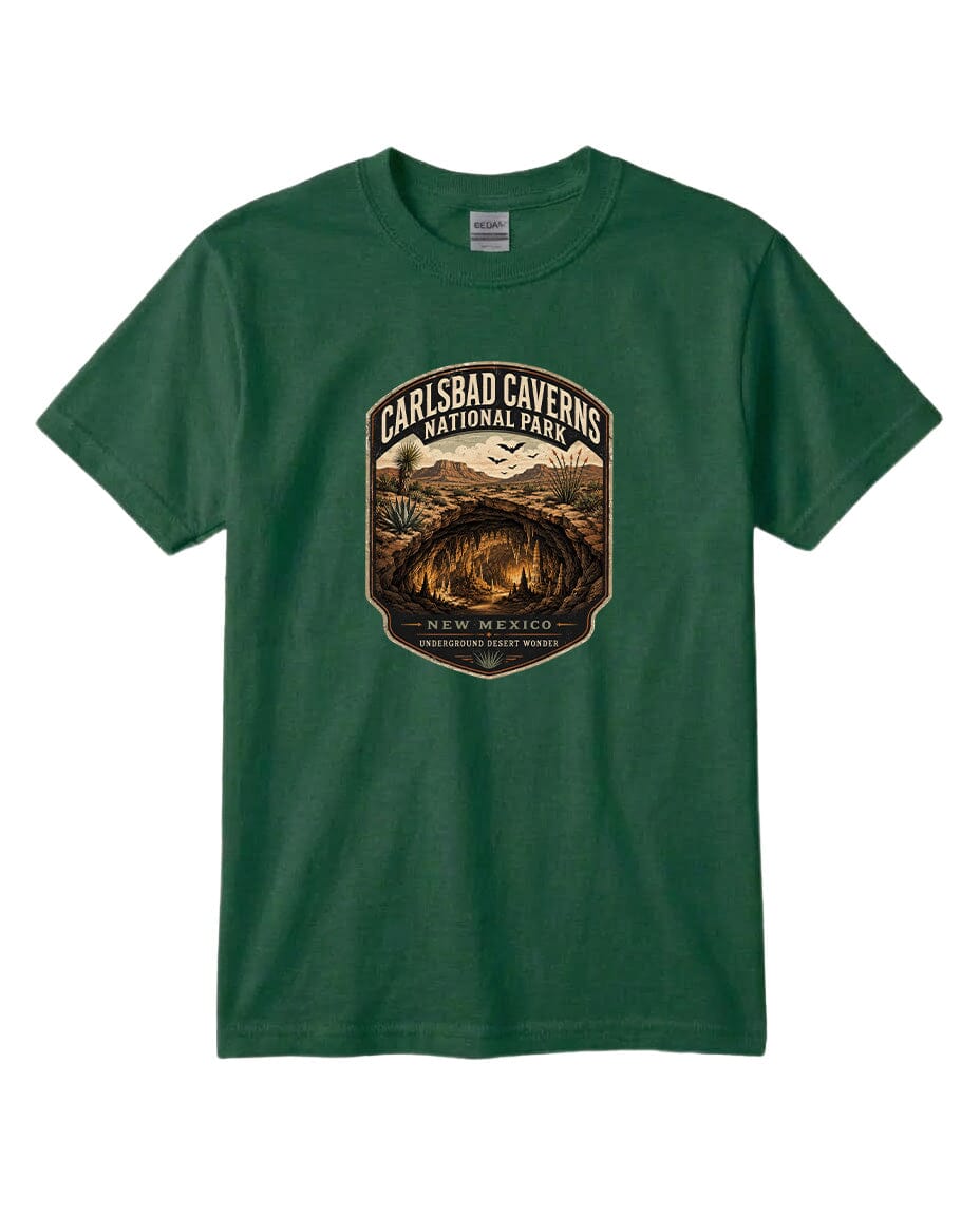 A green t-shirt with a graphic design depicting the entrance to Carlsbad Caverns National Park in New Mexico.
