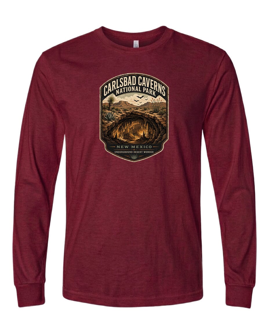 A red long-sleeved t-shirt with a graphic design depicting the Carlsbad Caverns National Park in New Mexico.