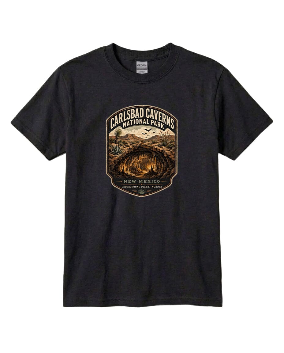 A black t-shirt with a graphic design depicting the entrance to Carlsbad Caverns National Park in New Mexico.