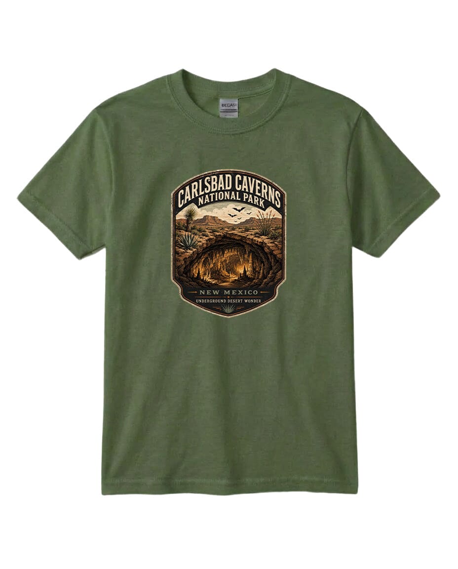 A green t-shirt with a graphic design depicting the entrance to Carlsbad Caverns National Park in New Mexico.
