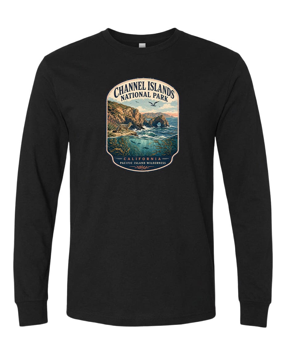 A black long-sleeve t-shirt with a graphic design depicting a scenic coastal landscape, including cliffs, water, and a sunset.