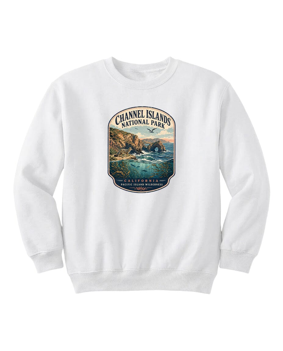 A white sweatshirt with a graphic design depicting a scenic coastal landscape with cliffs, water, and a sunset.