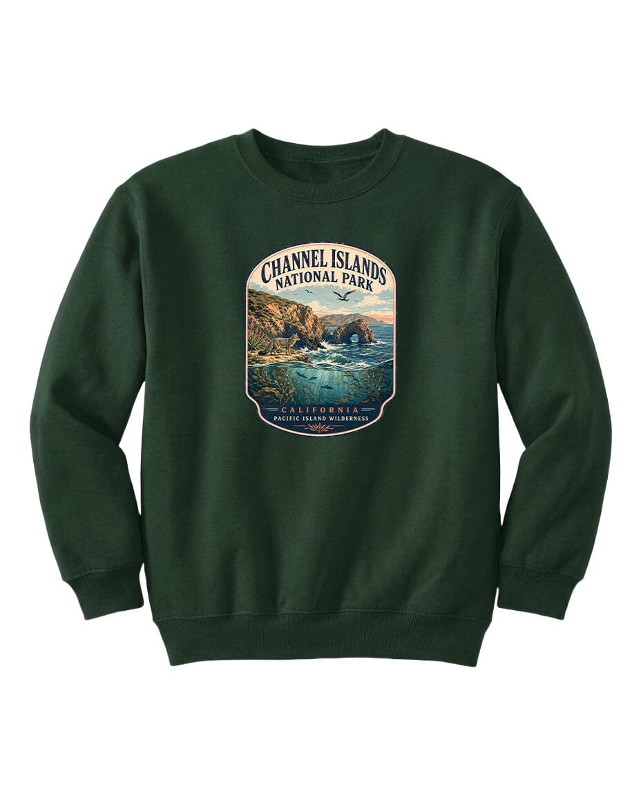 A green sweatshirt with a graphic design depicting a scenic coastal landscape, including cliffs, water, and a sunset.