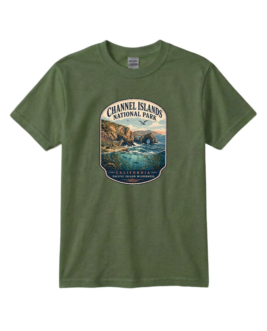 A green t-shirt with a graphic design depicting a scenic coastal landscape with cliffs, water, and a bird in flight.