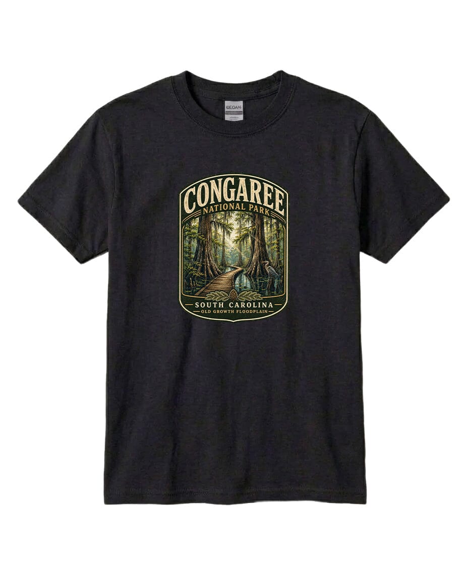 A black t-shirt with a graphic design depicting a forest scene with a path leading through it, surrounded by trees.