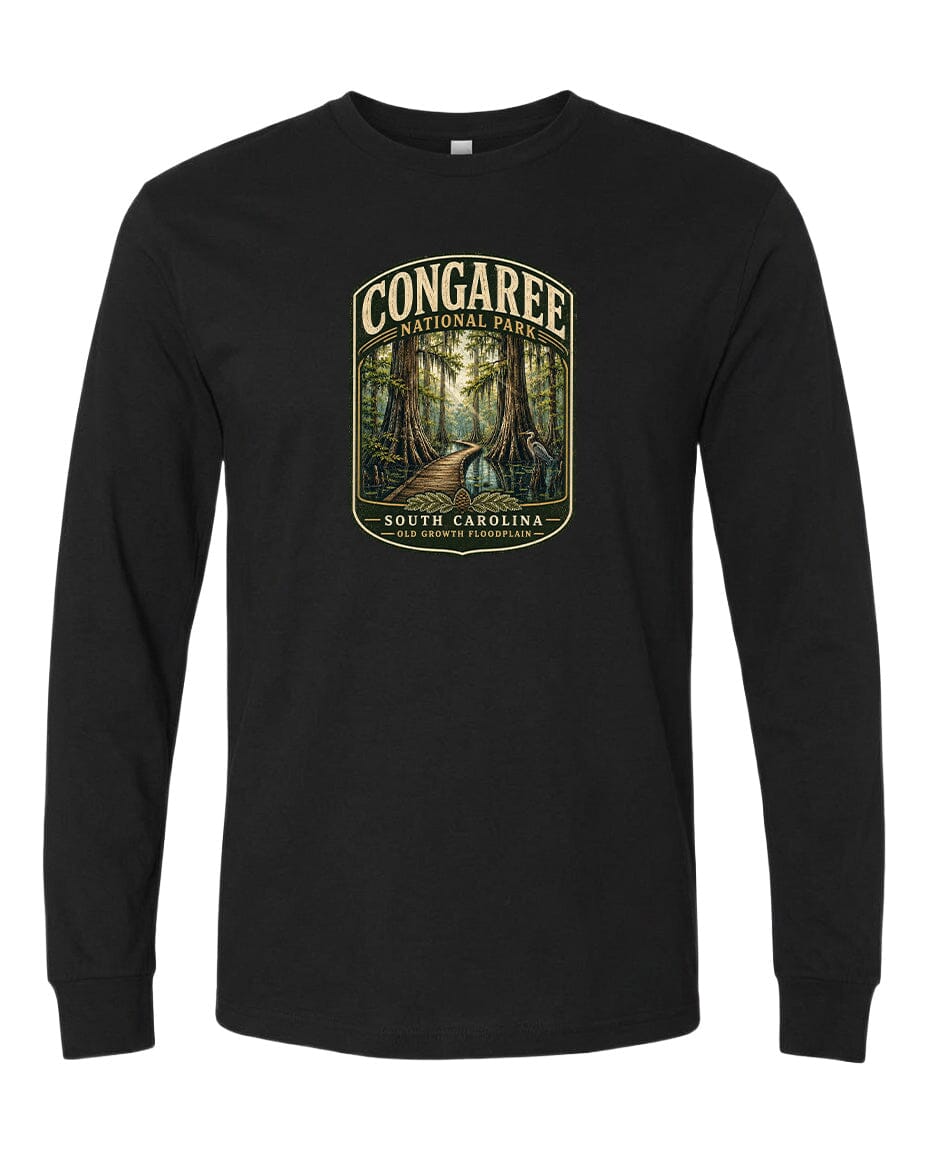 A black long-sleeve t-shirt with a graphic design depicting a forest scene with a path leading through it.