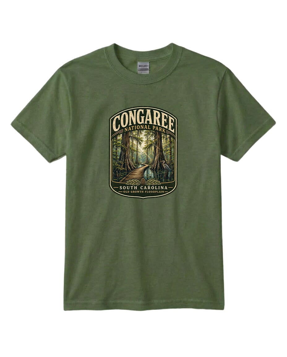 A green t-shirt with a graphic design depicting a forest scene with a path leading through it, surrounded by trees.
