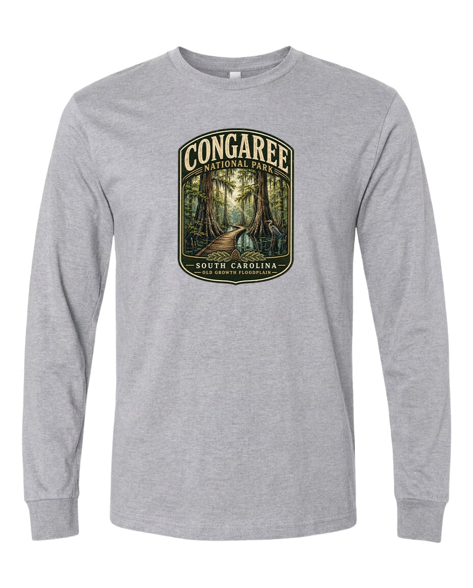 A gray long-sleeved t-shirt with a graphic design depicting a forest scene, featuring a path leading through the trees.