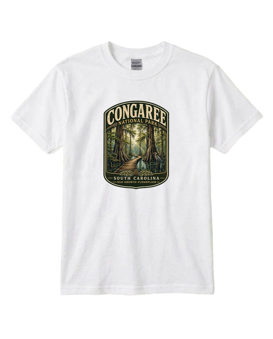 A white t-shirt with a graphic design depicting a forest scene with a path leading through it, surrounded by trees.