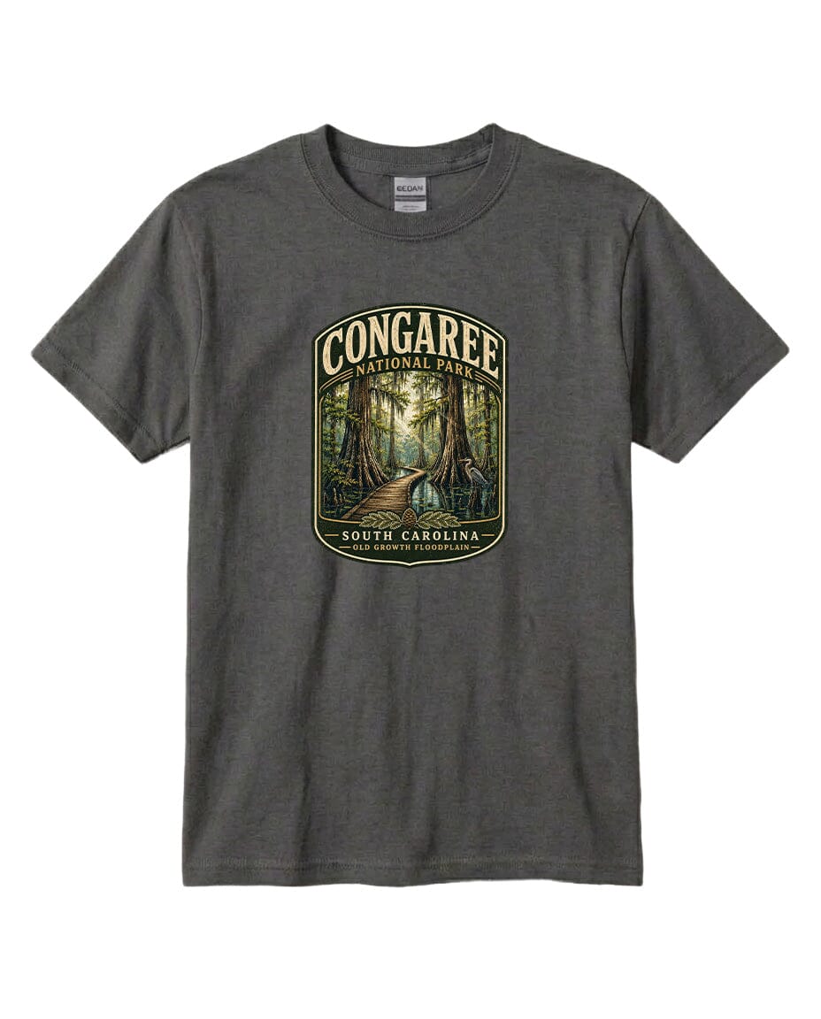 A gray t-shirt with a graphic design depicting a forest scene with a path leading through it, surrounded by trees.