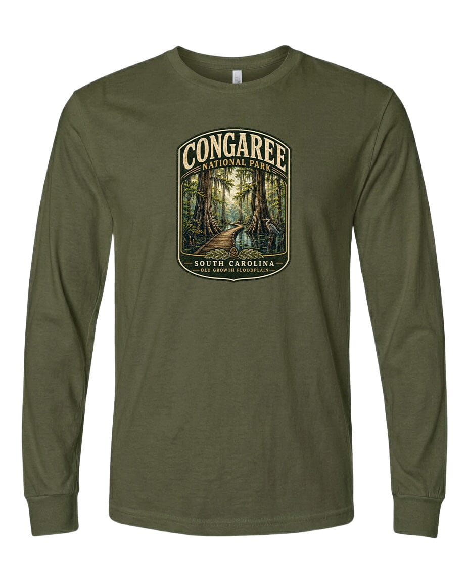 A green long-sleeved t-shirt with a graphic design depicting a forest scene, featuring a path leading through the trees.