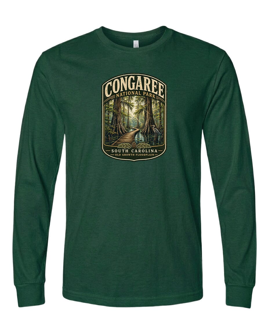 A green long-sleeved t-shirt with a graphic design depicting a forest scene, featuring a path leading through the trees.