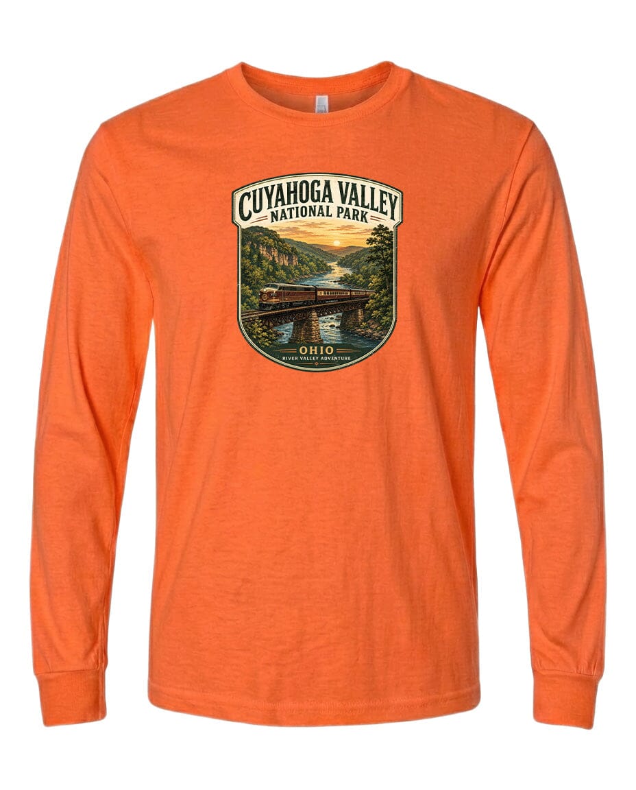 a long-sleeved orange t-shirt with a graphic design depicting a scenic view of the Cuyahoga Valley National Park.