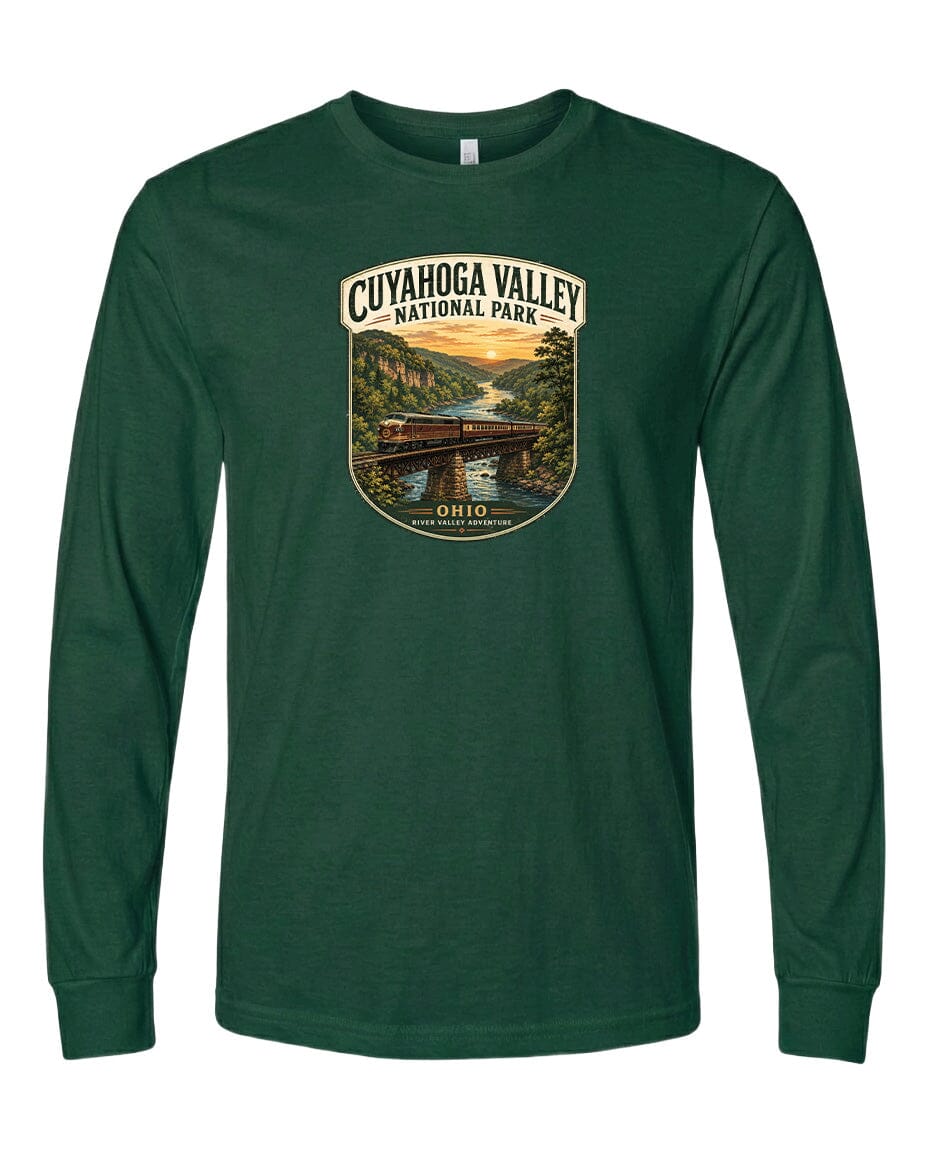 A green long-sleeved t-shirt with a graphic design depicting a scenic view of the Cuyahoga Valley National Park, featuring a bridge, trees, and a river.