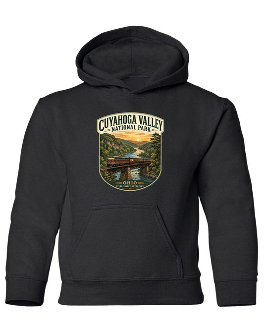 A black hoodie with a graphic design depicting a scenic view of Cuyahoga Valley National Park, featuring a bridge and a river.