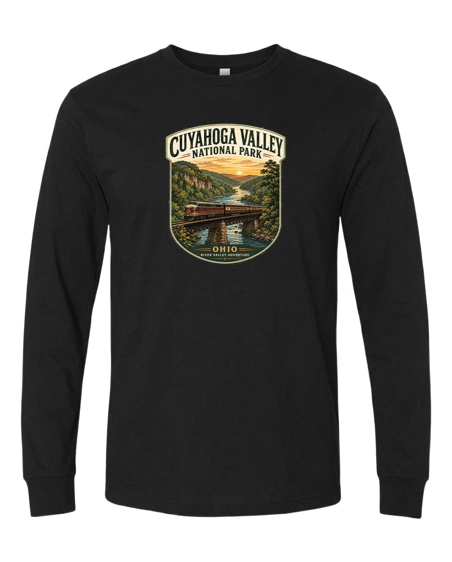 A black long-sleeve t-shirt with a graphic design depicting a scenic view of the Cuyahogah Valley National Park, featuring a bridge, trees, and a sunset over a river.