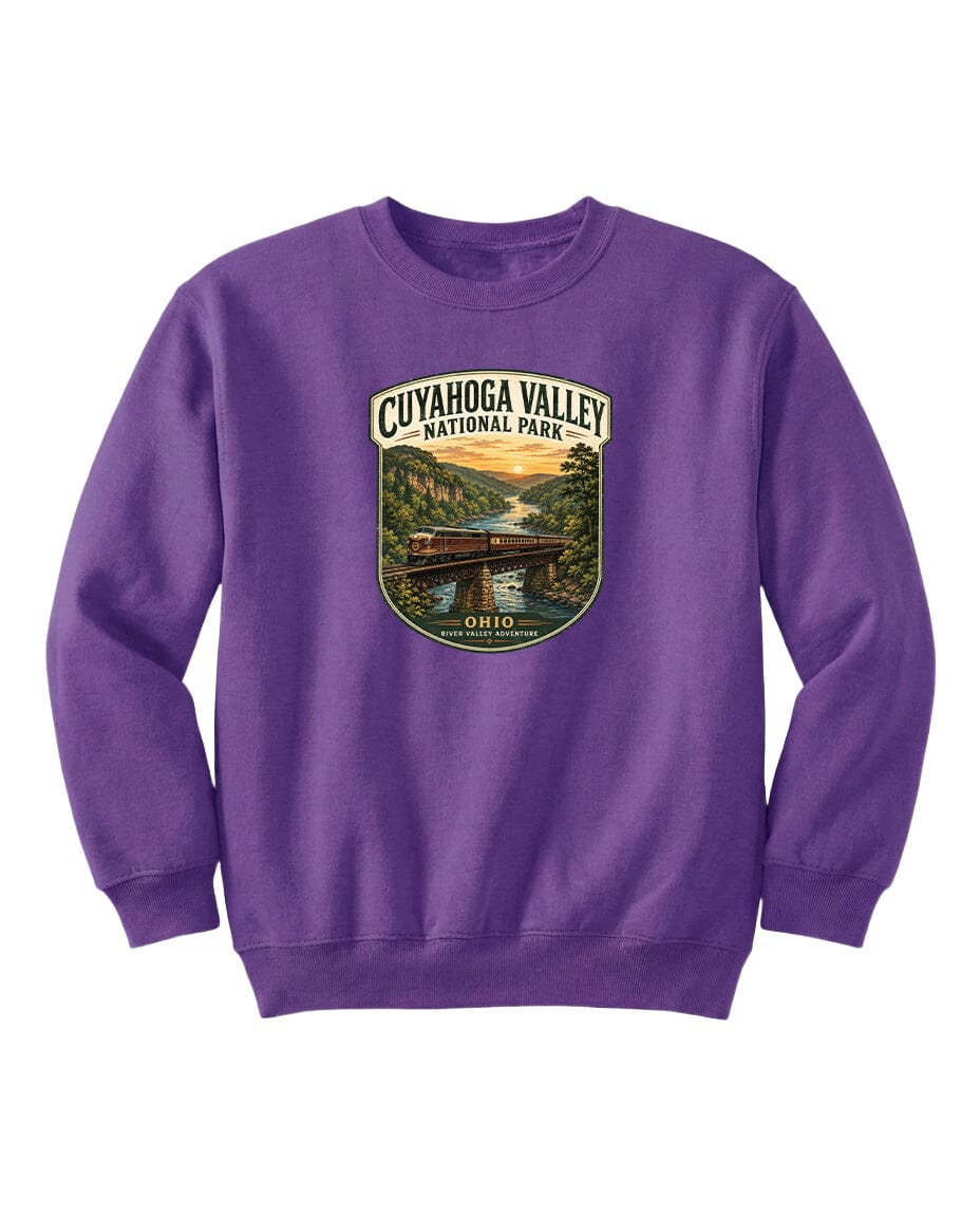 A purple sweatshirt with a graphic design depicting a scenic view of the Cuyahoga Valley National Park in Ohio.