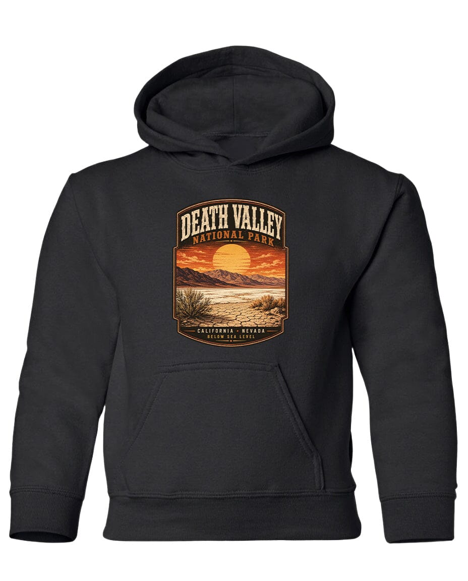 A black hoodie with a graphic design depicting Death Valley National Park, including a sunset and desert landscape.
