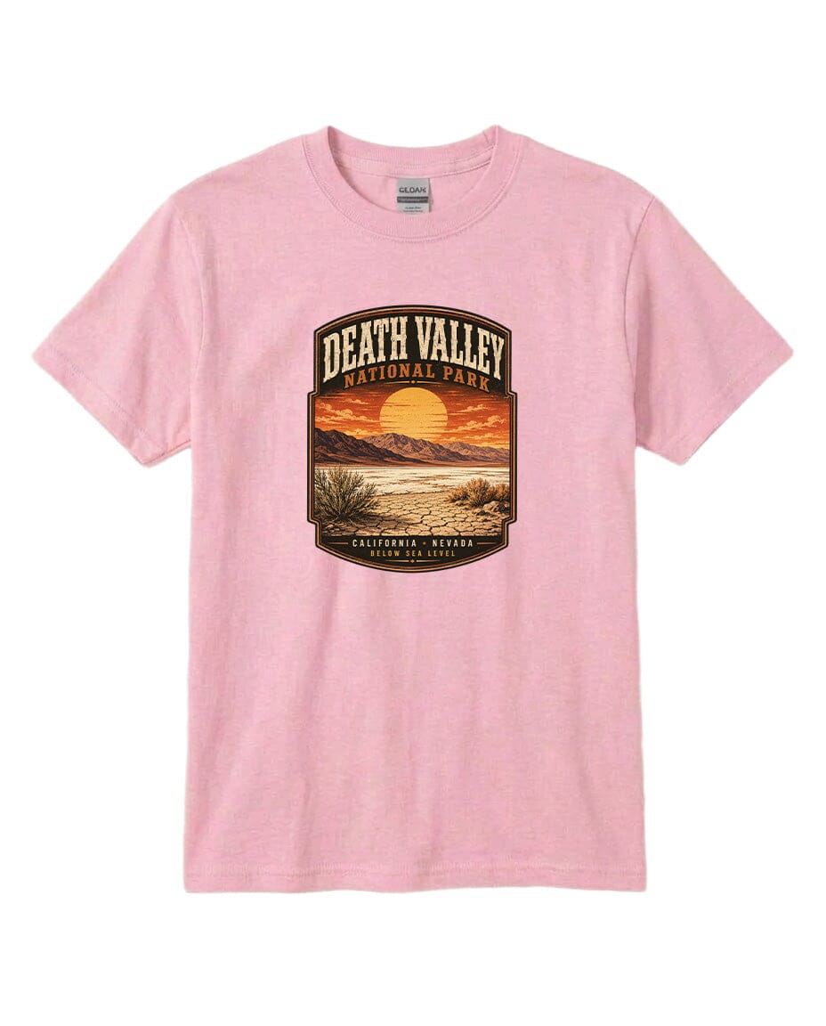 A pink t-shirt with a graphic design depicting a sunset over Death Valley National Park, California, Nevada.