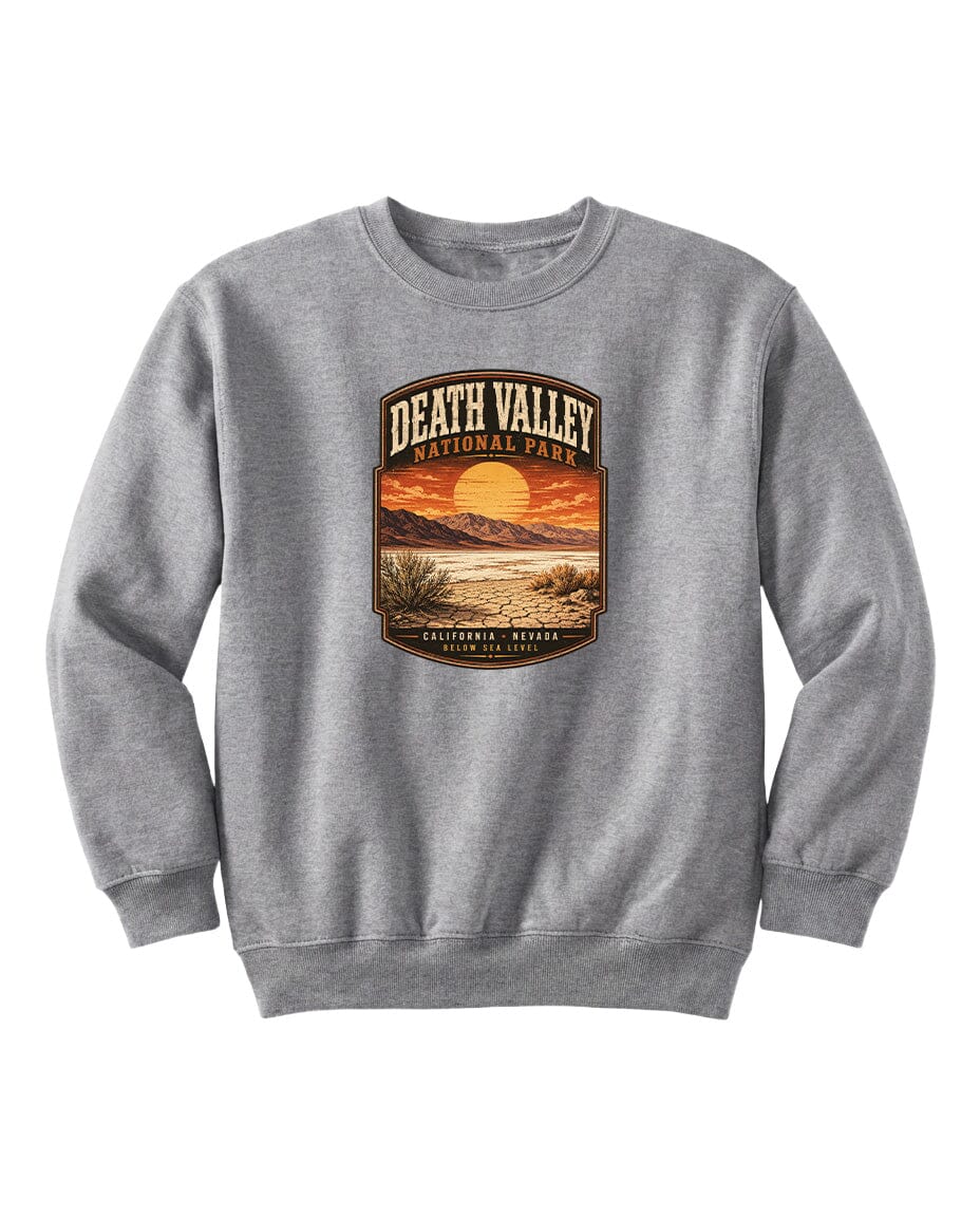 A gray sweatshirt with a graphic design depicting a sunset over Death Valley National Park.