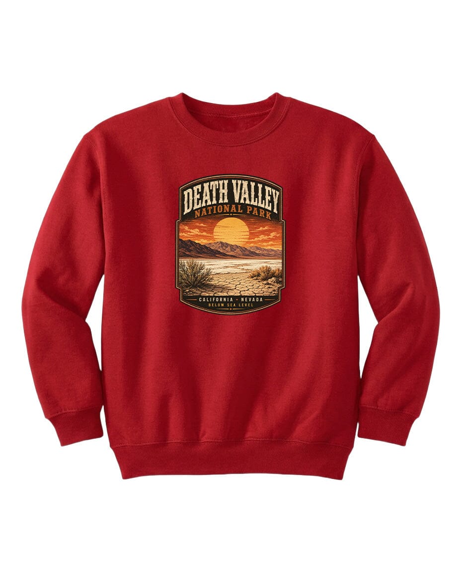 A red sweatshirt with a graphic design depicting a sunset over Death Valley National Park.
