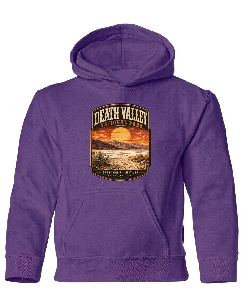 A purple hoodie with a graphic design depicting Death Valley National Park and a sunset landscape.