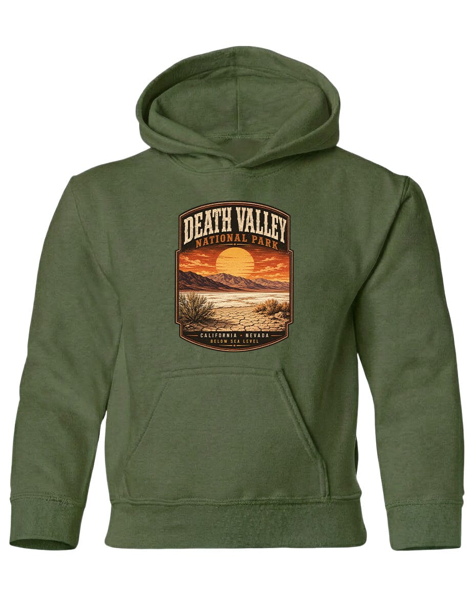 A green hoodie with a graphic design depicting Death Valley National Park, including a sunset, mountains, and a desert landscape.