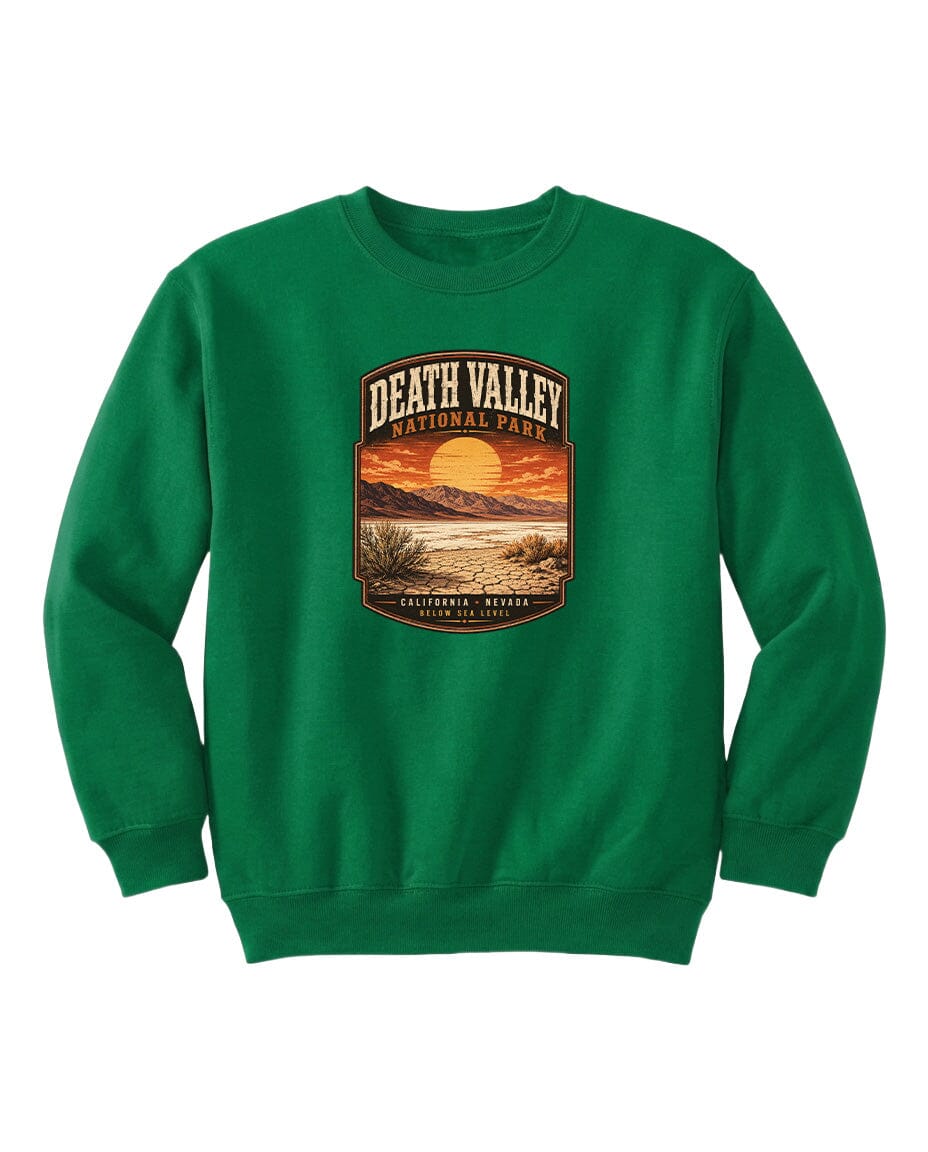 A green sweatshirt with a graphic design depicting a sunset over Death Valley National Park.