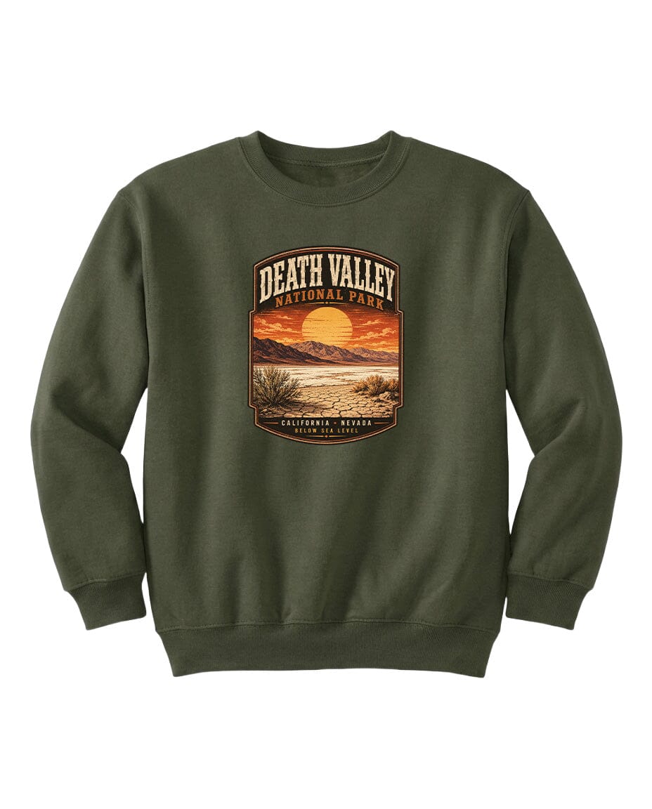 A green sweatshirt with a graphic design depicting a sunset over Death Valley National Park.