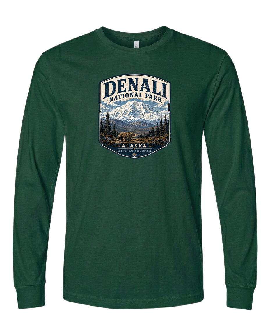 A green long-sleeved t-shirt with a graphic design depicting a mountain landscape and bears, along with the text "DENALI NATIONAL PARK ALASKA LAST GREAT WILDERNESS".