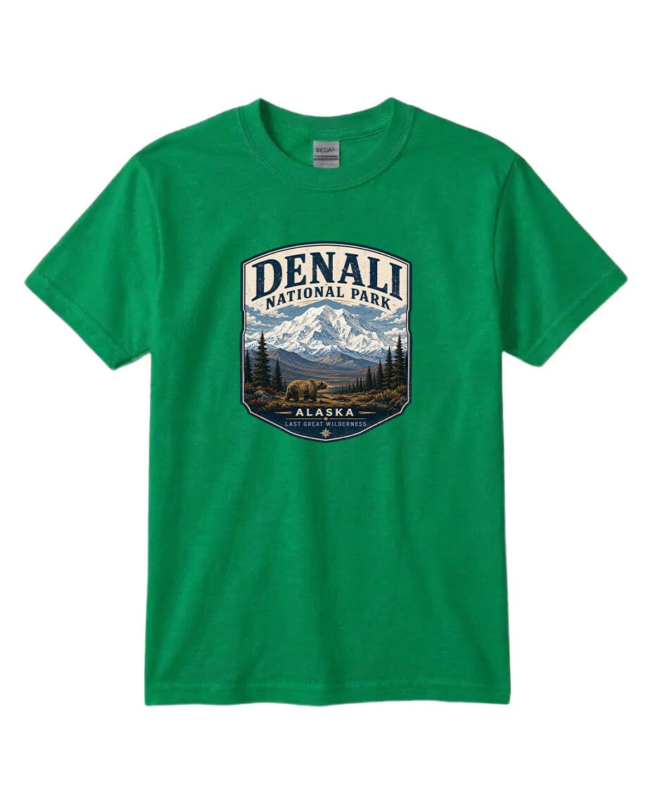 A green t-shirt with a graphic design depicting a mountain landscape and bears, representing Denali National Park in Alaska.